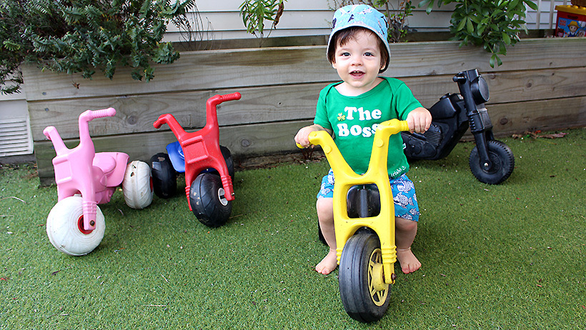 boy on trike at childcare