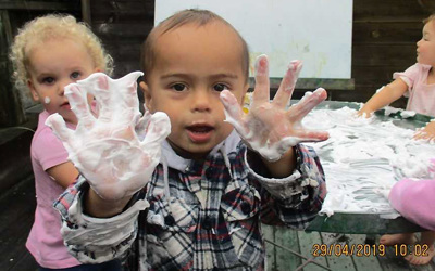 children playing with soap at Tauranga childcare